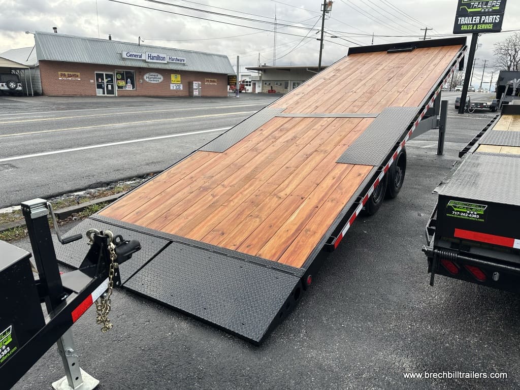 A brand new Bwise THD 19.2K Hydraulic Tilt-Deck Gooseneck Trailer for sale in the parking lot.
