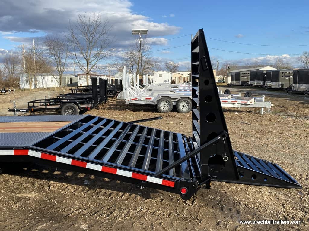 Ramps on the back of the trailer folding out