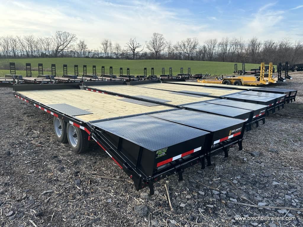Trailers lined up in the parking lot for sale