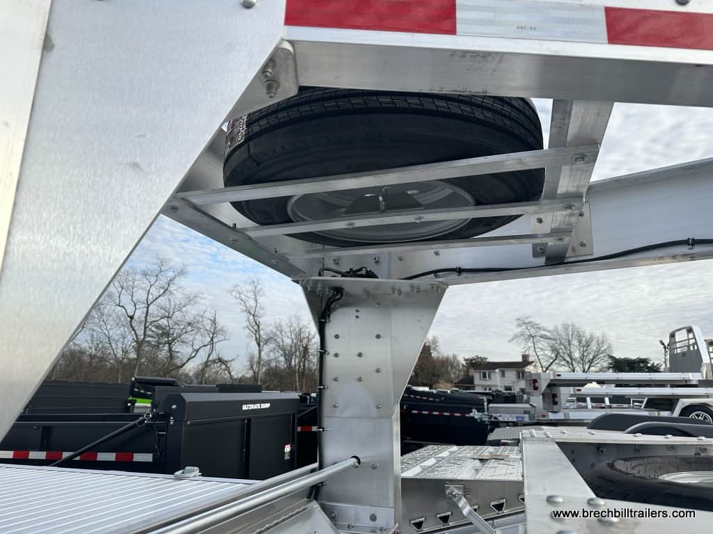 Spare tire on the EBY 15.9K Deck-Over Gooseneck Equipment Trailer