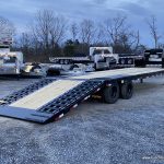 Big Tex 25.9K Heavy Duty Tandem Dual Wheel Gooseneck Trailer parked in the yard.