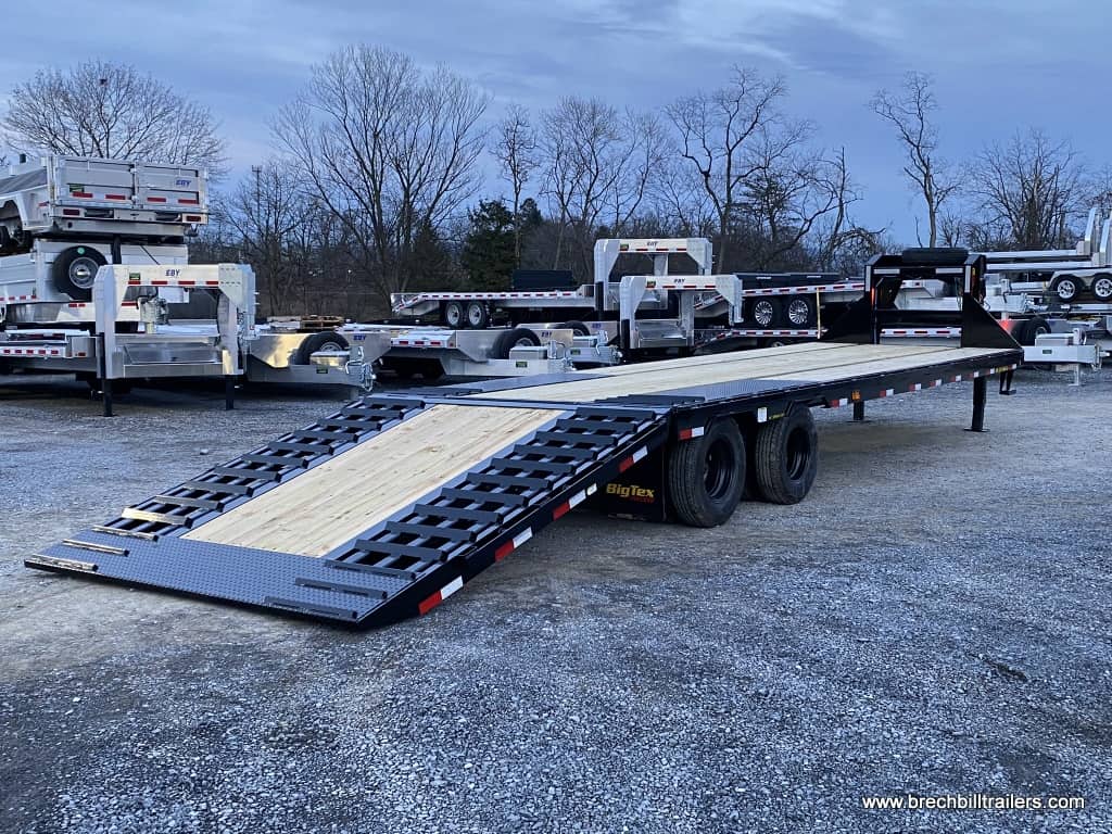 Big Tex 25.9K Heavy Duty Tandem Dual Wheel Gooseneck Trailer parked in the yard.