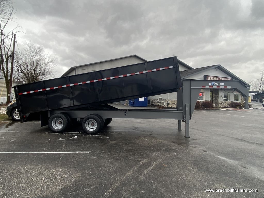 Bwise Deck Over 23K Tube Frame Dump Trailer in the front parking lot