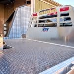 EBY flatbed truck body with headache rack and stake pockets