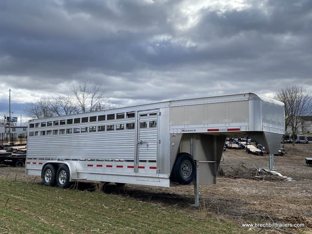 Side view of a parked EBY Maverick 14K Gooseneck Livestock Trailer