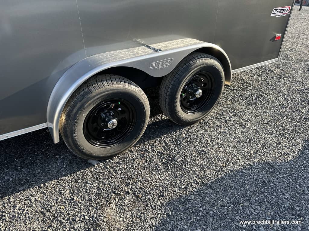 Black wheels on the charcoal gray Bravo Scout enclosed cargo trailer