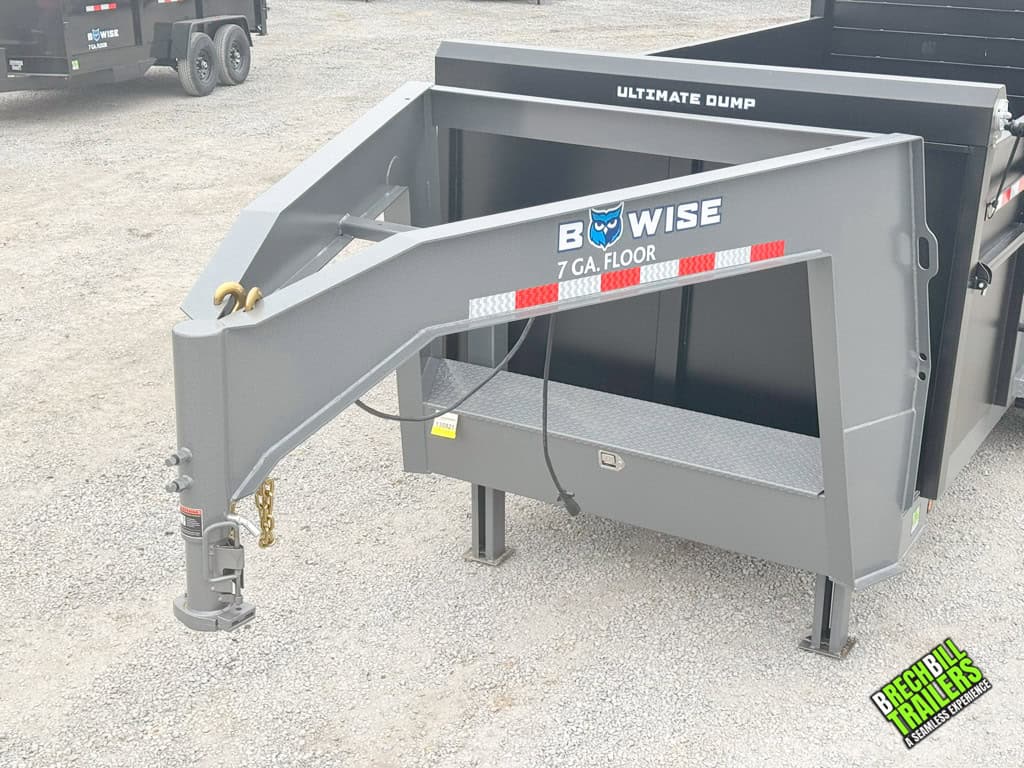 Gray gooseneck and frame with black dump bed on the trailer