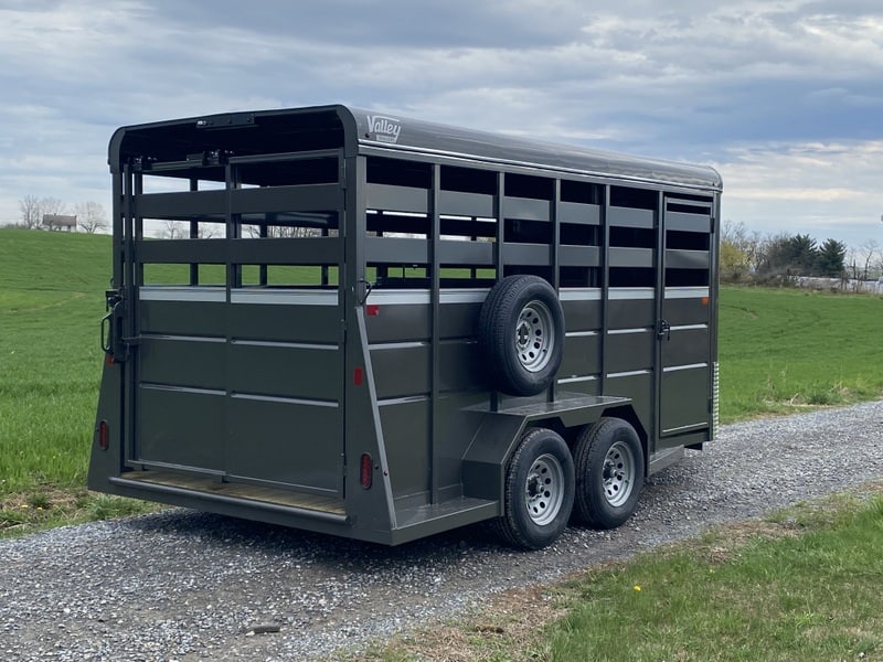 Side view of the charcoal gray Valley 7K Steel Livestock Trailer