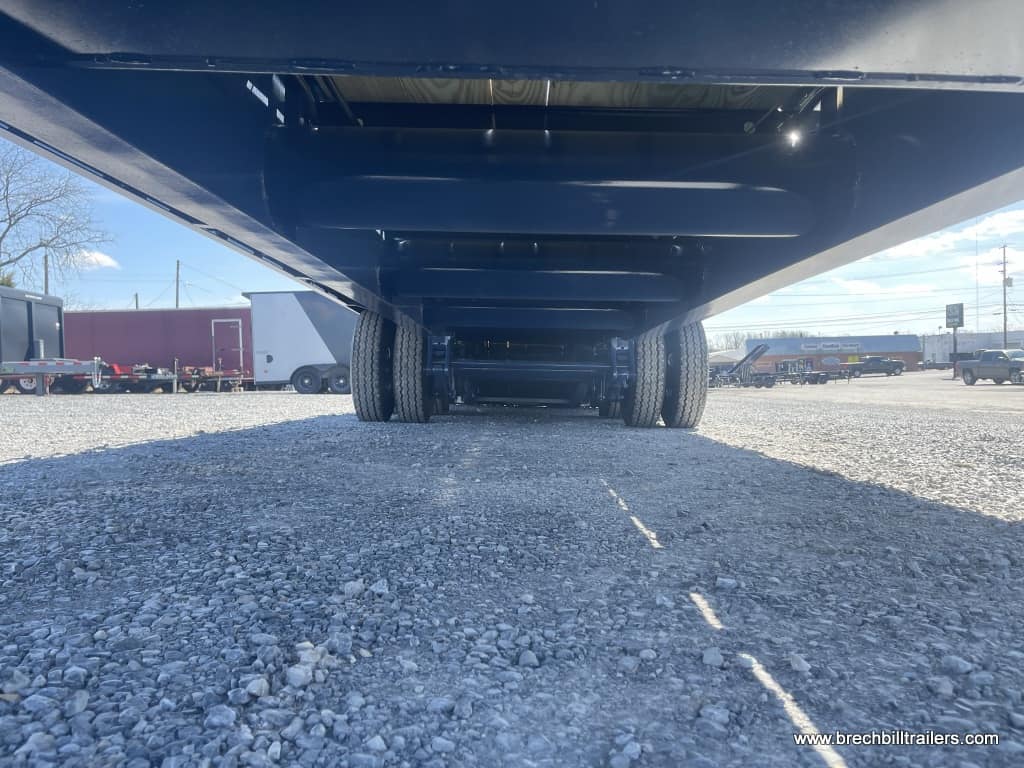 Underneath the Belmont 26K Hydraulic Dovetail Gooseneck Trailer
