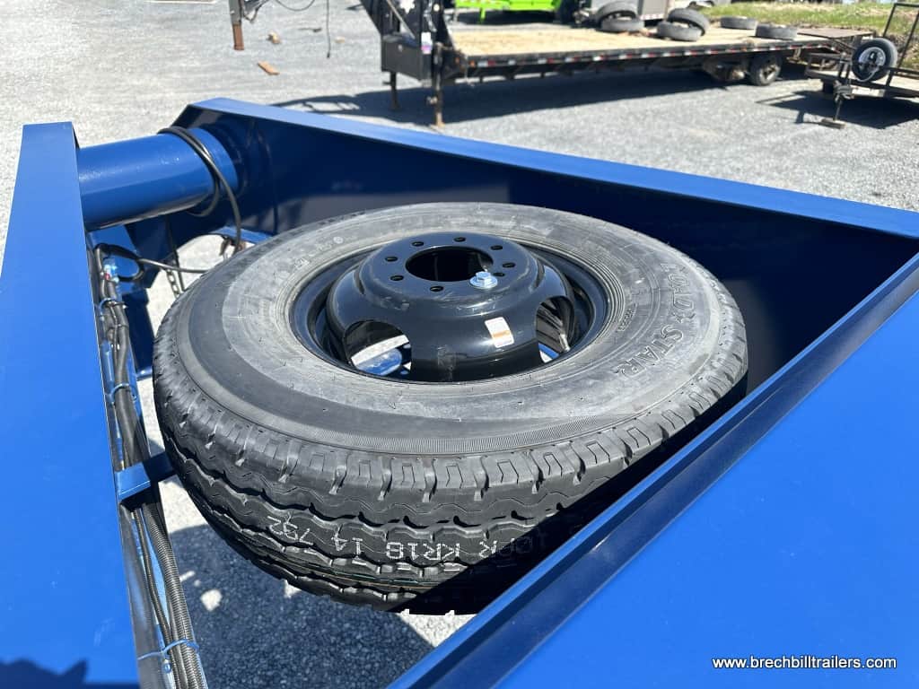Spare wheel mounted on the Belmont 26K Hydraulic Dovetail Gooseneck Trailer 8.5x32