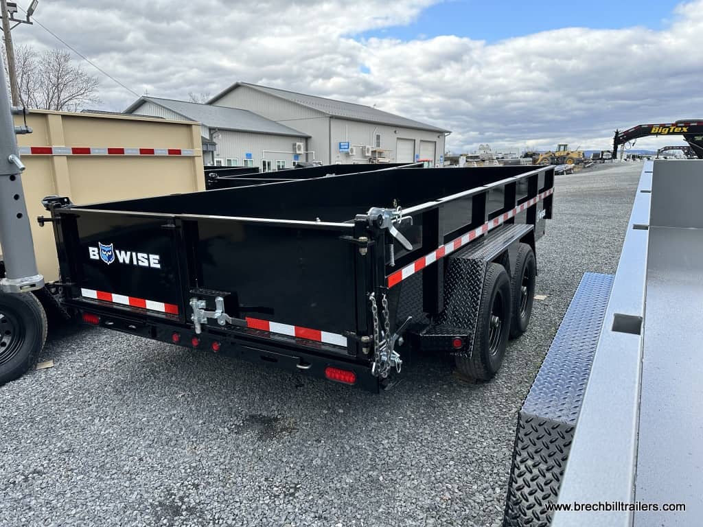 A 7x16 Bwise DLP Heavy Duty 15K Dump Trailer parked in the lot.