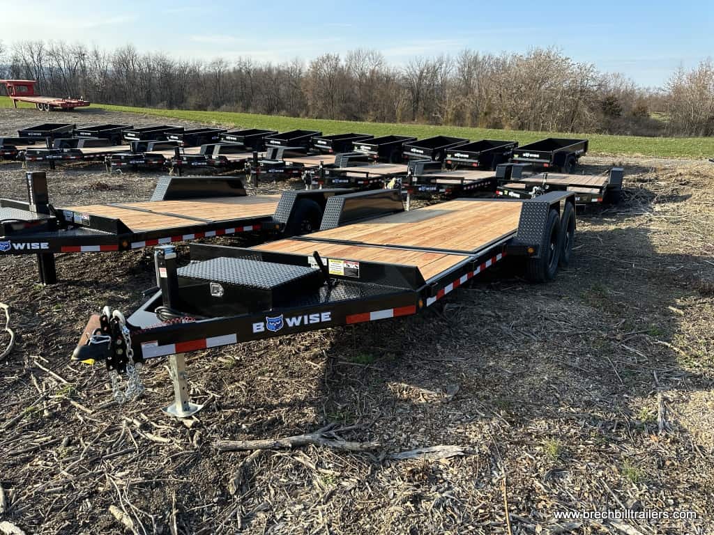 A lot full of Bwise 15K Gravity Tilt Deck Trailers for sale