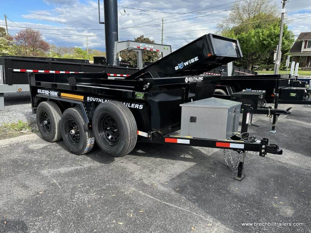 Brand new Southland 10K Tandem Axle Dump Trailer parked in the lot.