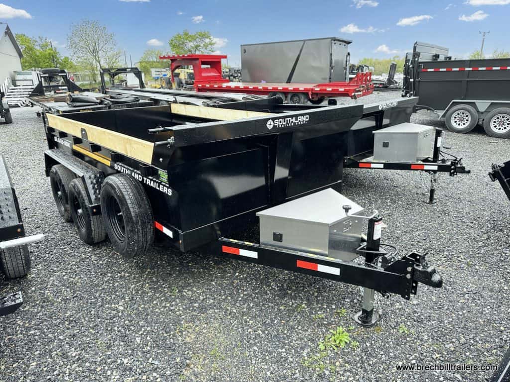 A black Southland 10K Tandem Axle Dump Trailer