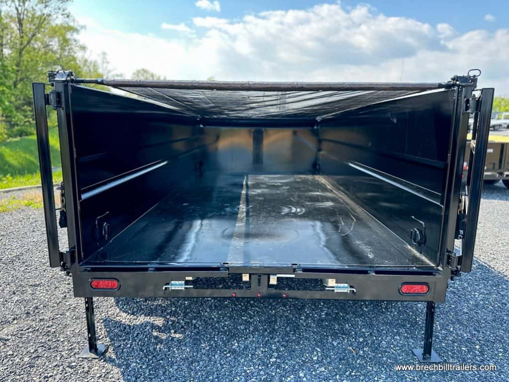 Inside the Southland 17K High Side Dump Trailer with the tarp covering the top.