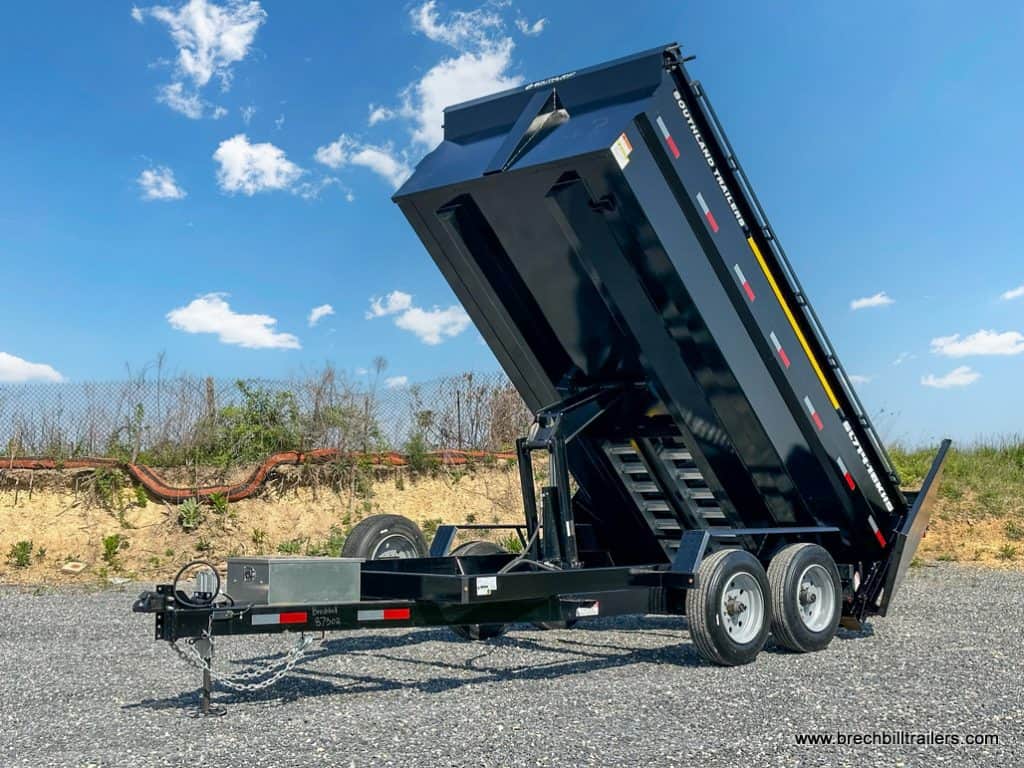 Southland Trailers High side dump trailer dumping showing the sill designed engineered beams