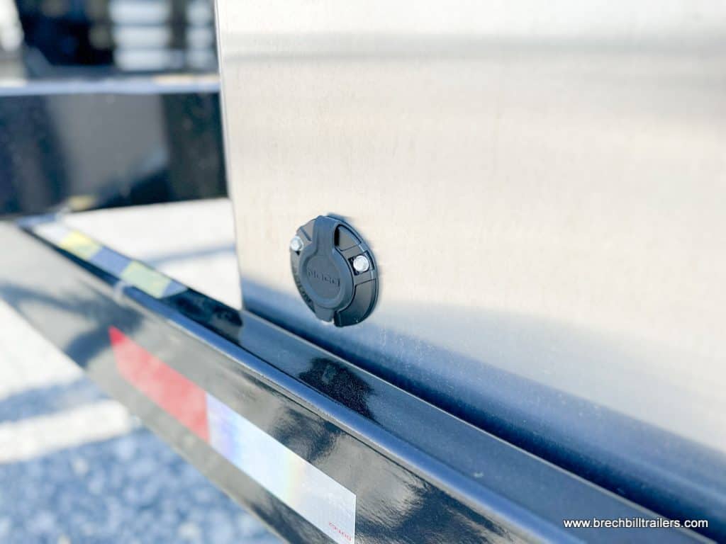 Plug on side of the trailer.