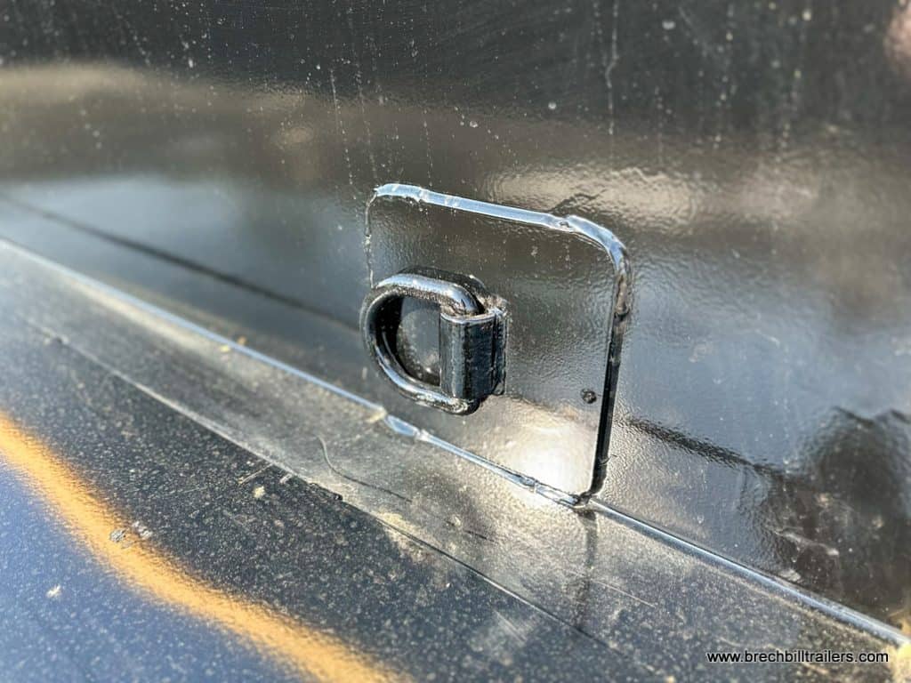 D ring on the inside of the trailer.