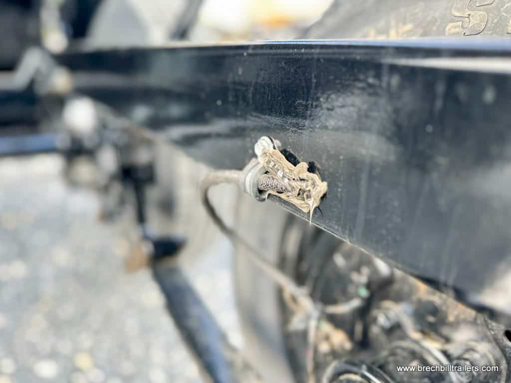 Closeup of the Southland 7K Tandem Axle Dump Trailer 5'x10' (SL510-7K)