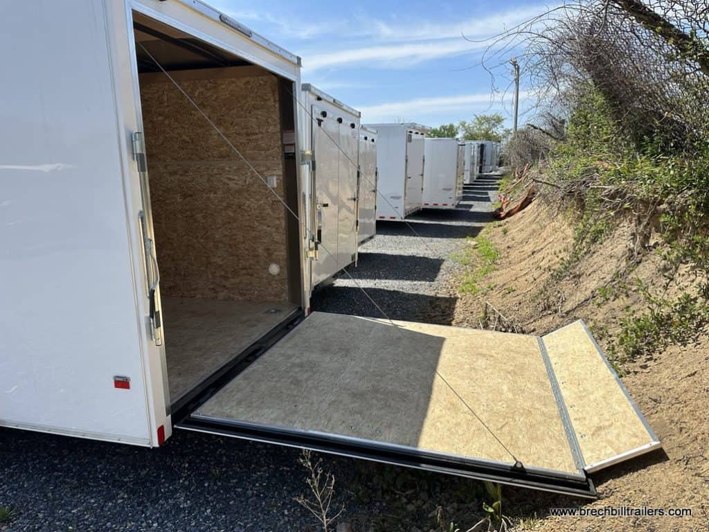 Bravo Scout 7K Enclosed Cargo Trailer with the ramp door down.
