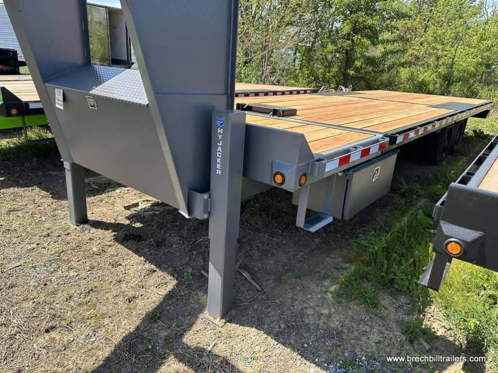A parked Bwise 19K THD Hydraulic Tilt-Deck Gooseneck Trailer for sale.