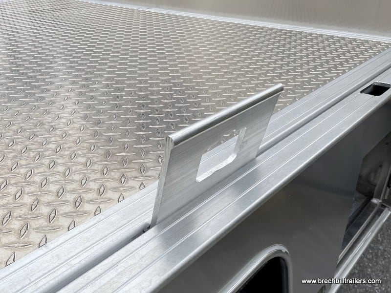 Adjustable cargo tiedowns on the trailer.