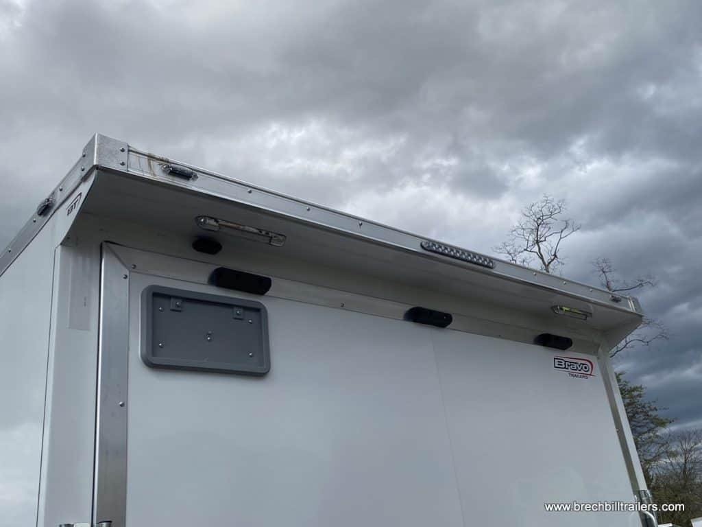 Lights mounted on the back of the Bravo Star 10K Enclosed Cargo Trailer