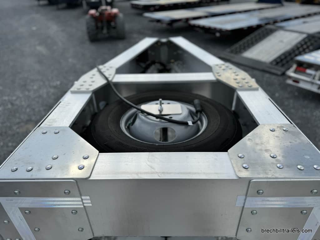 Spare wheel mounted on the trailer.