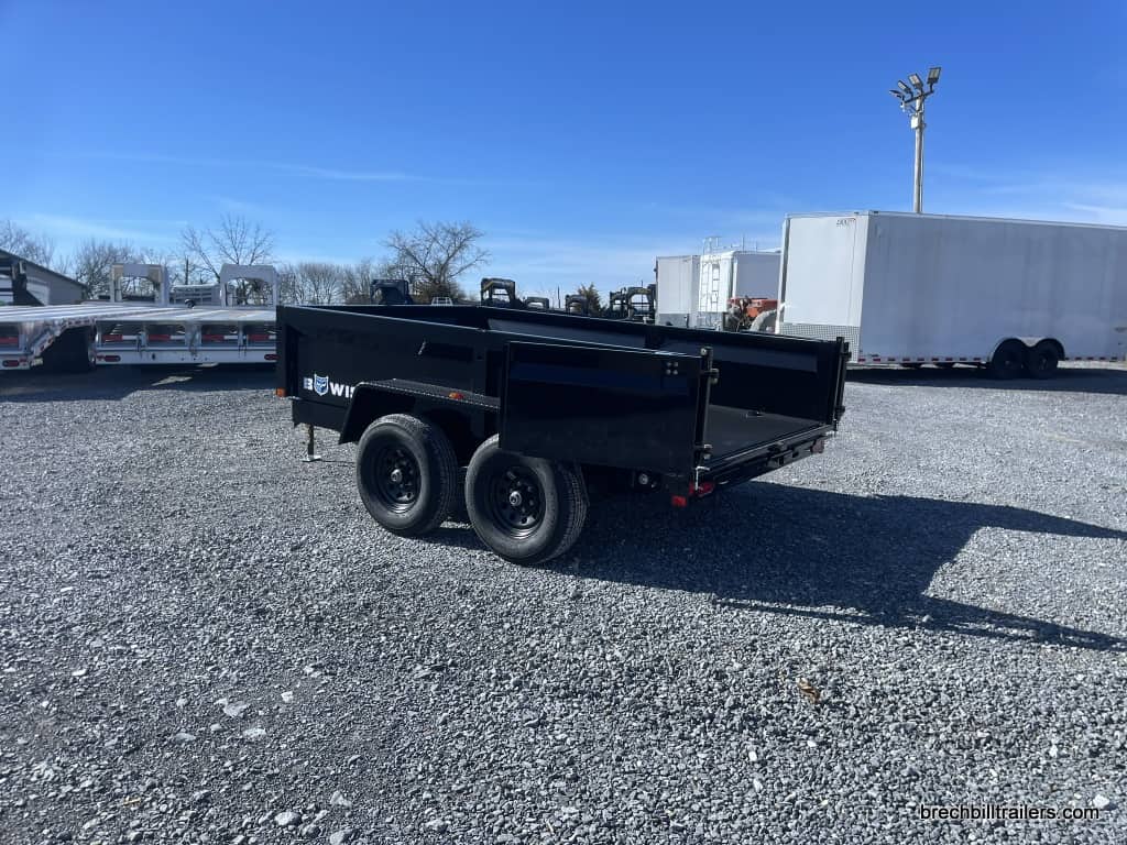 Rear gates open for dumping.