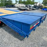 Blue ramps on the back of the Belmont gooseneck trailer.