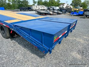Blue ramps on the back of the Belmont gooseneck trailer.