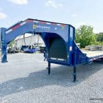 A blue 30ft Belmont 26K Heavy Duty Gooseneck Trailer