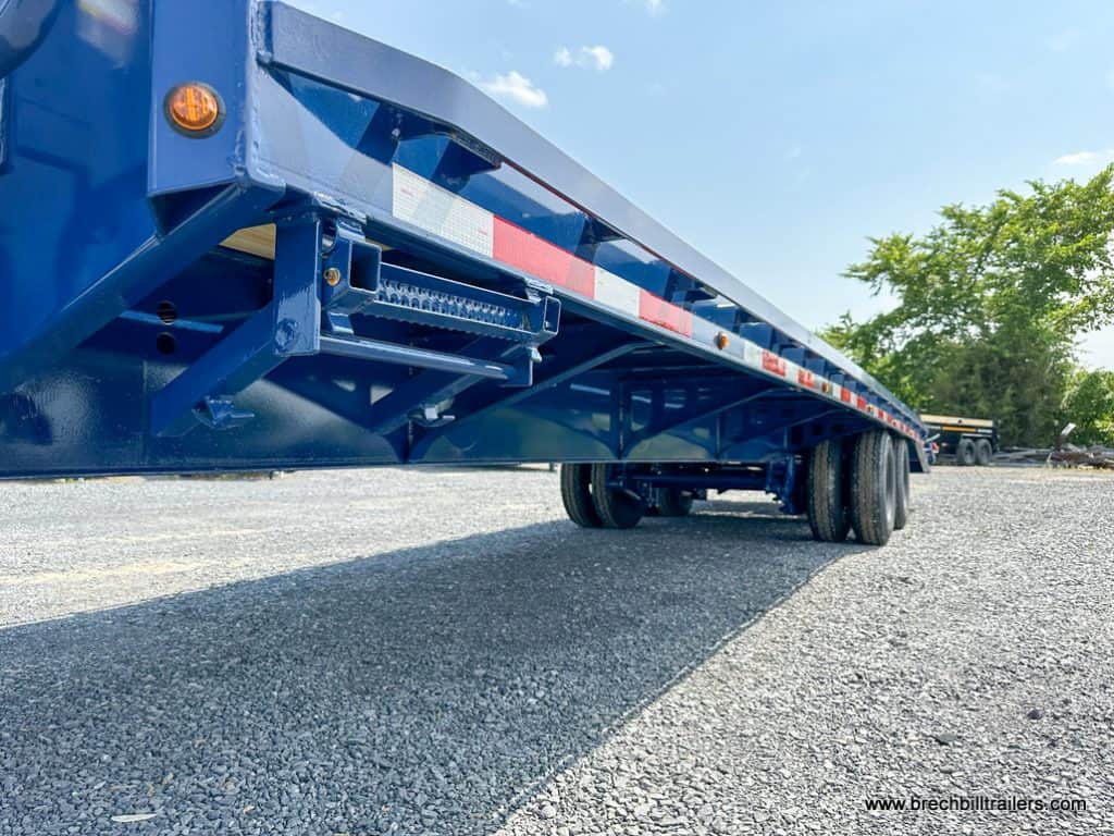 Looking down the side of the 30ft Belmont 26K Heavy Duty Gooseneck Trailer
