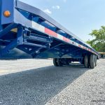 Looking down the side of the 30ft Belmont 26K Heavy Duty Gooseneck Trailer