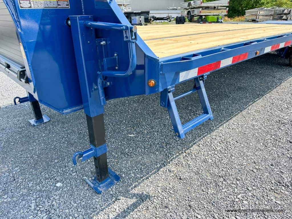 Step on side of the trailer.