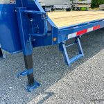 Step on side of the trailer.
