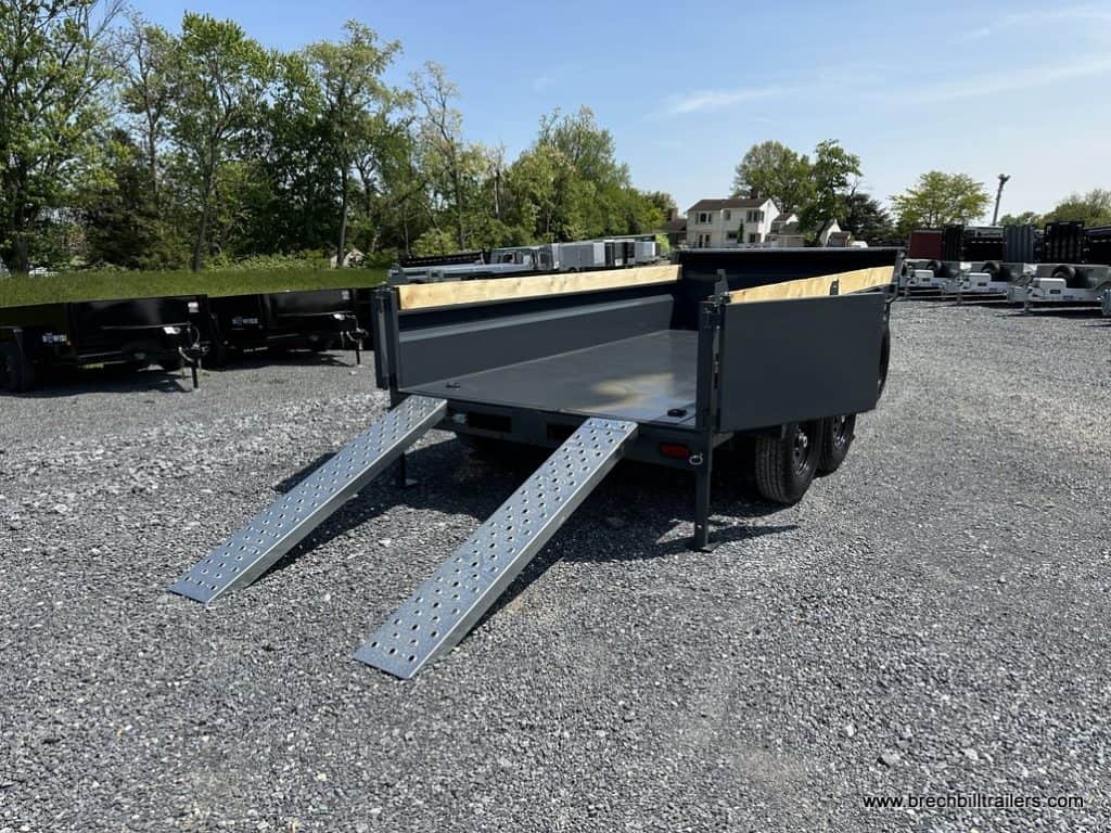 Southland 15K Tandem Axle Dump Trailer with ramps down for display.
