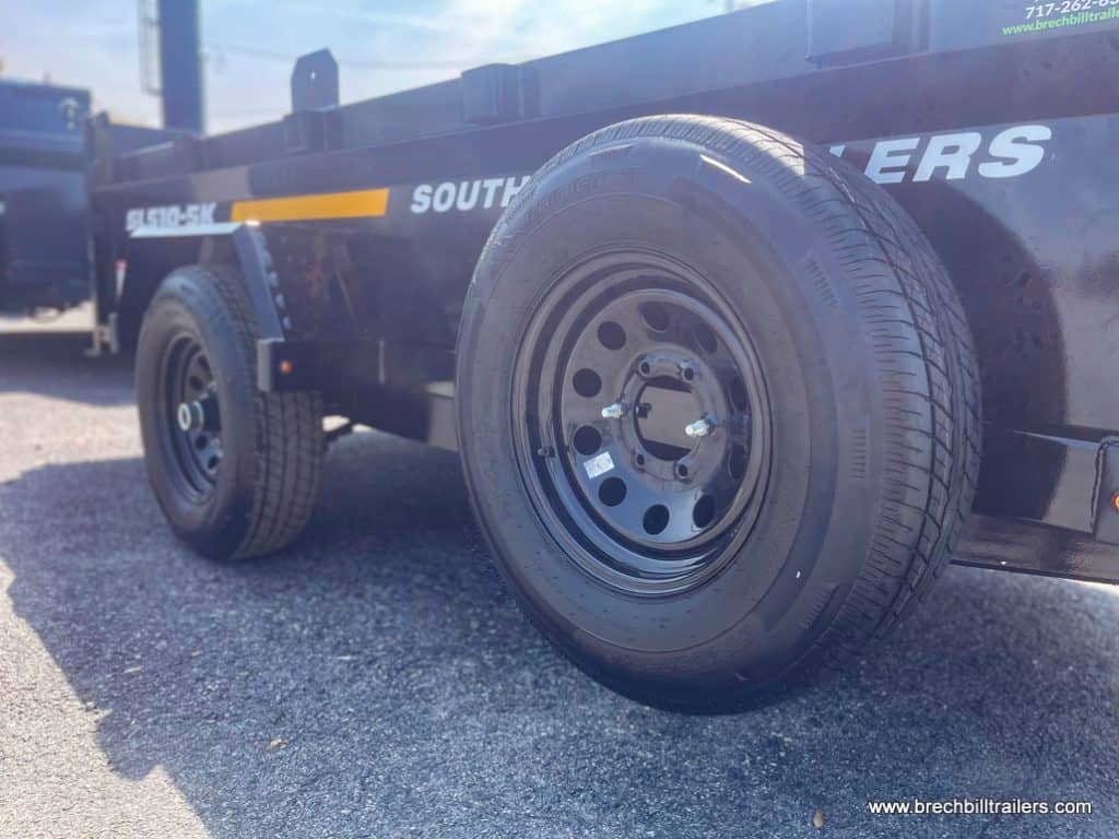 Spare tire mounted on the side.