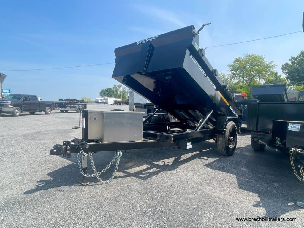 Southland 5K Single Axle Dump Trailer in the dumping position for display.