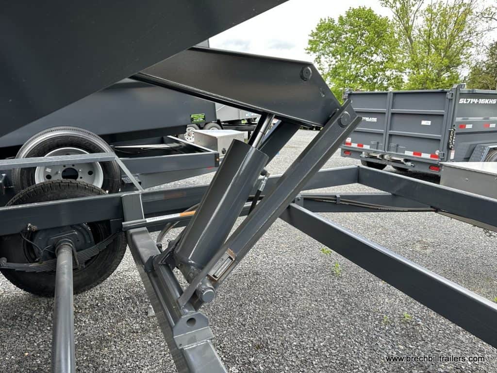 The hydraulic cylinder on the dump trailer.
