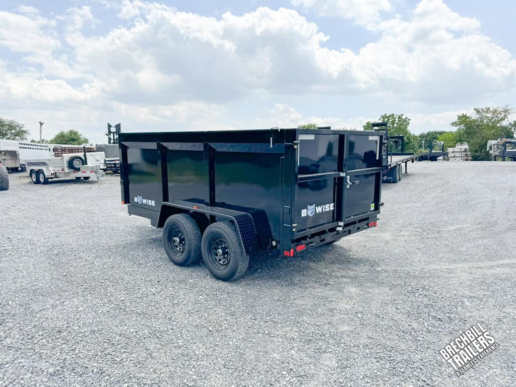 Back view of Bwise 10K High Side Dump Trailer parked in the lot.