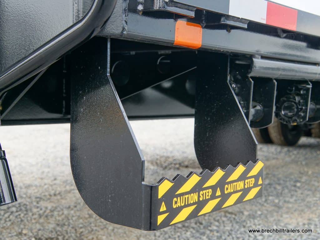Caution step on the side of a Southland gooseneck trailer.
