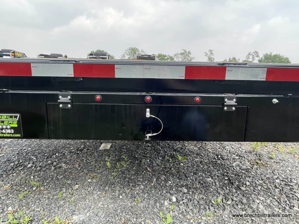 Side of trailer with reflective tape.