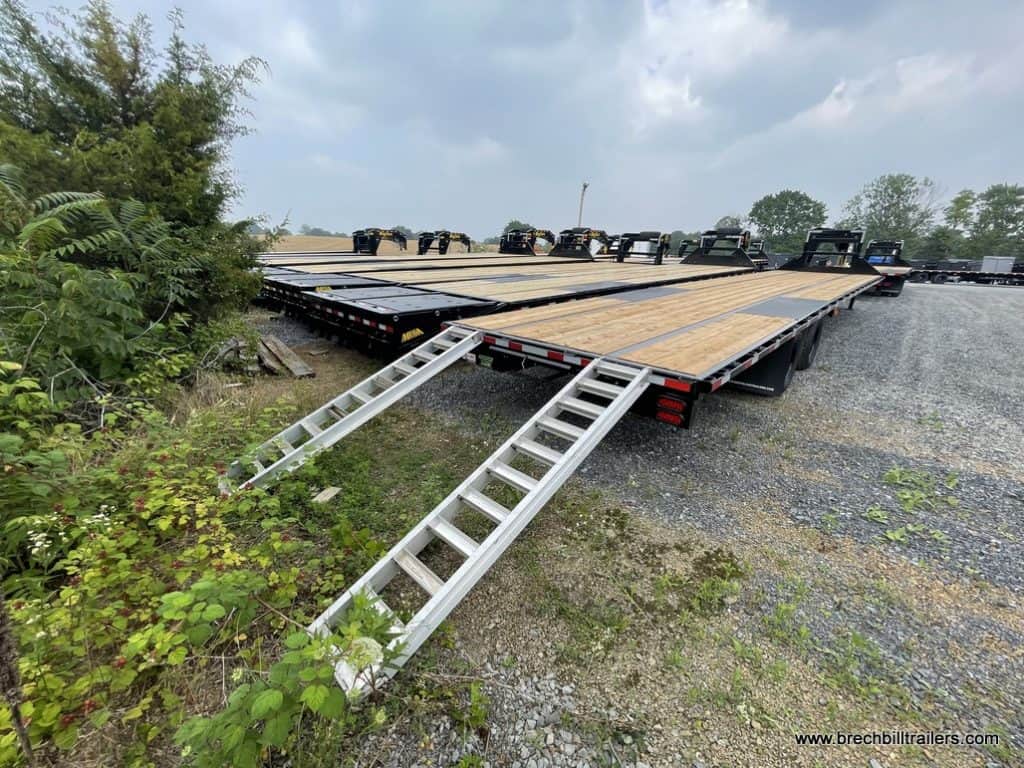 Ramps attached to the back of the trailer.