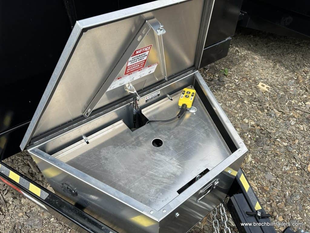Open box with hydraulic controls inside.