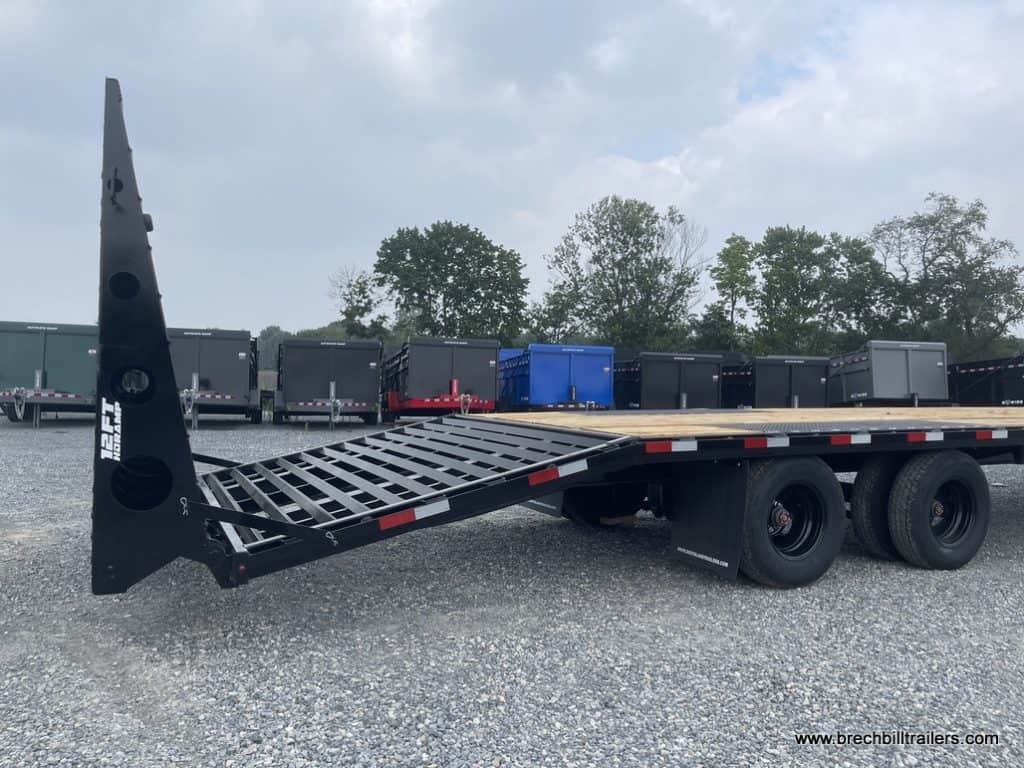 Back of a Southland 29K Tandem Dual Gooseneck Trailer with ramps folding down.