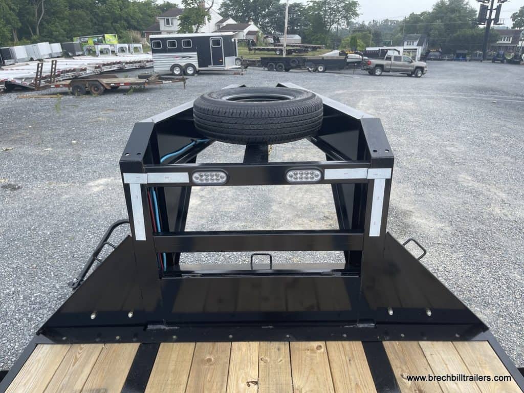 Spare wheel mounted on the trailer.