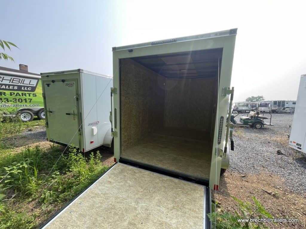 Bravo Scout 3K Enclosed Cargo Trailer parked in the lot.