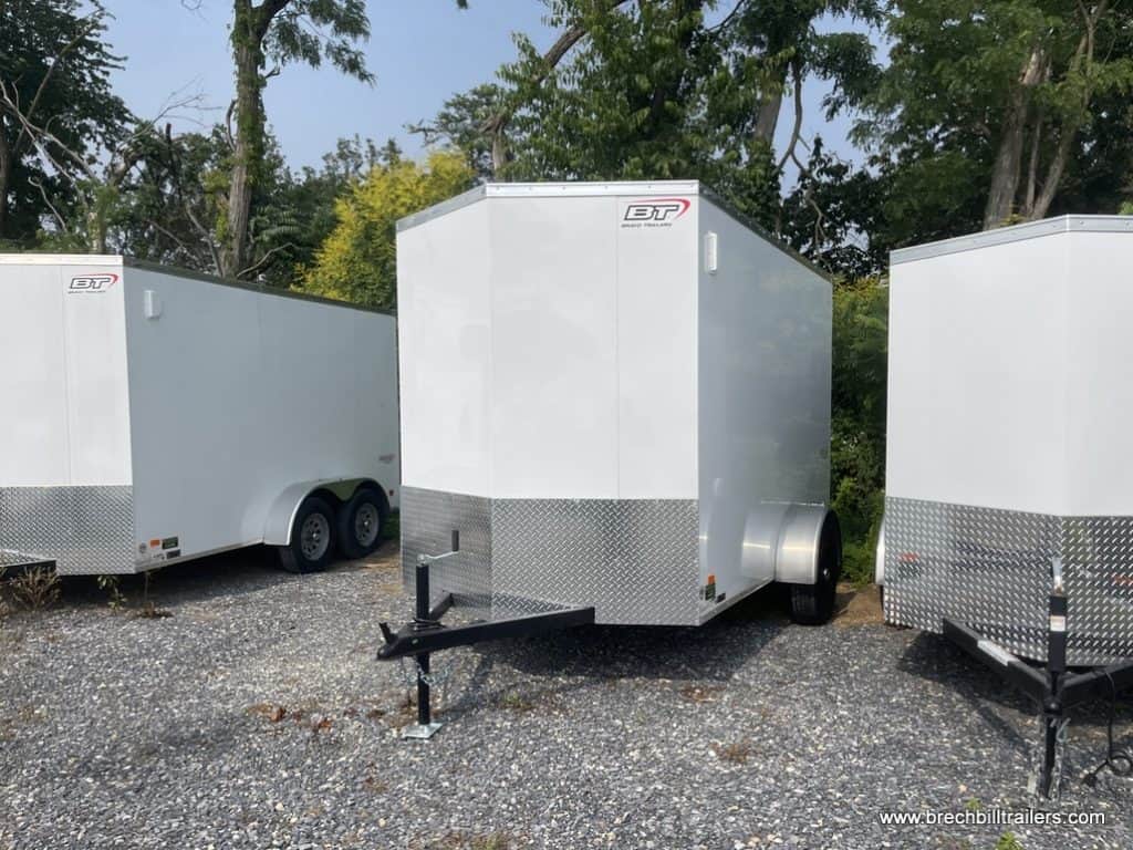 A 6ft by 10.5ft Bravo Scout 3K Enclosed Cargo Trailer