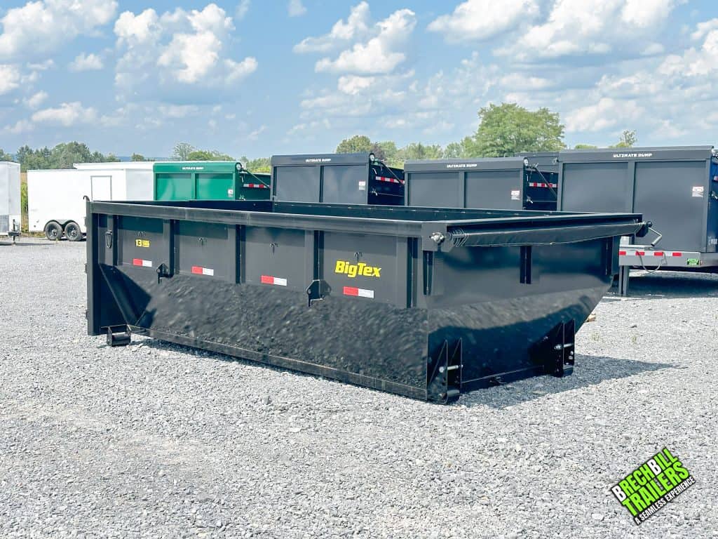 Black Big Tex Roll Off Trailer Bin dropped off at the Brechbill Trailers lot